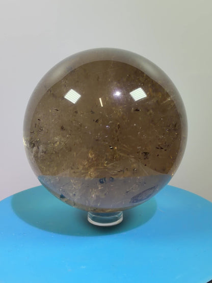 Rutile Quartz Sphere. 70mm. Large Smoky Quartz With Rare Golden Rutile Inclusions. Nice Quality Display