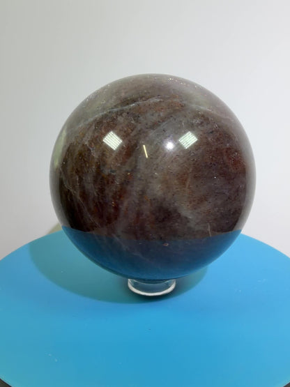 Bloodshot Iolite Sphere. 64mm. Stunning Galaxy Iolite Sunstone Display Sphere. Amazing And Colorful Flash!