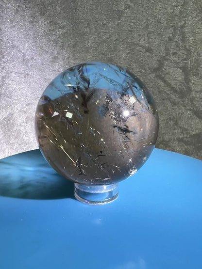 Rutile Quartz Sphere. Amazing Rainbows! Light Smoky Quartz With Stunning Golden Rutile Inclusions.