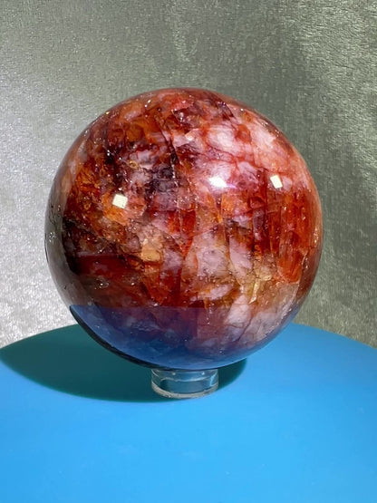 Fire Quartz Sphere. 63mm. Gorgeous Flash And Crystallization. High Quality Hematoid Crystal From Madagascar.