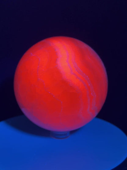 Mangano Calcite Sphere. 72mm. Very Intense Orange UV Reaction. Large High Quality Display Crystal From Peru.