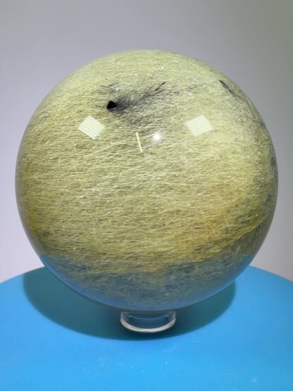 Black Tourmaline And Rabbit Hair Quartz Sphere. 70mm. Stunning Rabbit Hair Rutile With Black Tourmaline Inclusions. Very Rare Display Sphere.