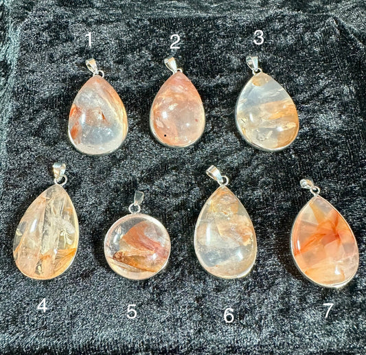 Natural Fire Quartz Pendants. Beautiful Crystal Necklace. Includes 24" Silver plated chain or leather cord upon request.